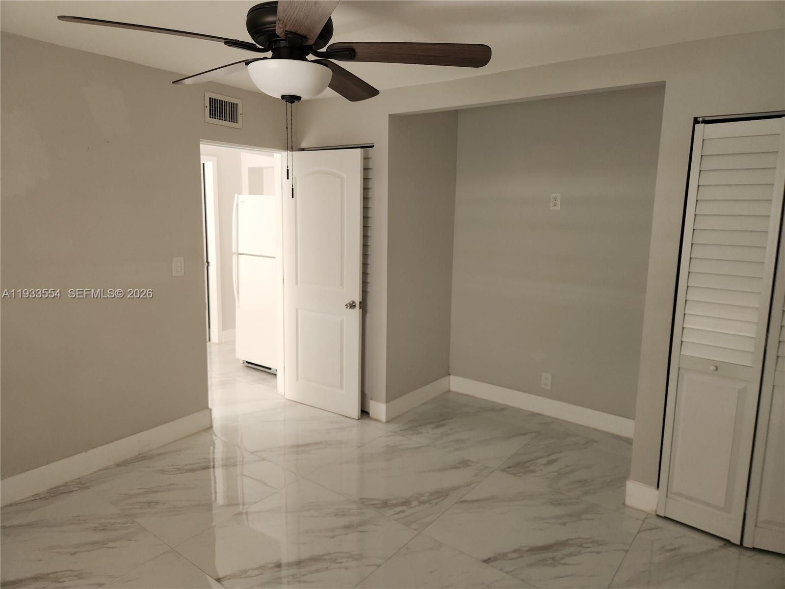 342 East 46th Street, Unit 2 Hialeah, FL 33013 - Photo 9 of 15 a view of an empty room