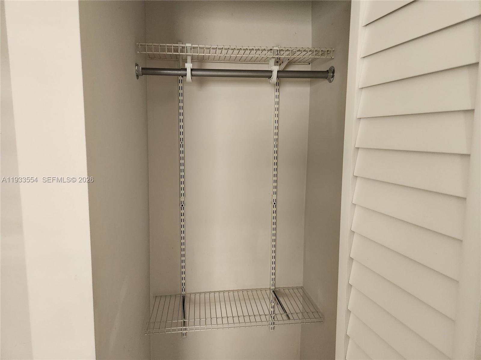 342 East 46th Street, Unit 2 Hialeah, FL 33013 - Photo 10 of 15 a view of a room with racks on the wall