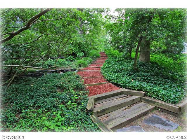 3016 Williamswood Road North Chesterfield, VA 23235 - Photo 13 of 15 a view of a bench in a garden