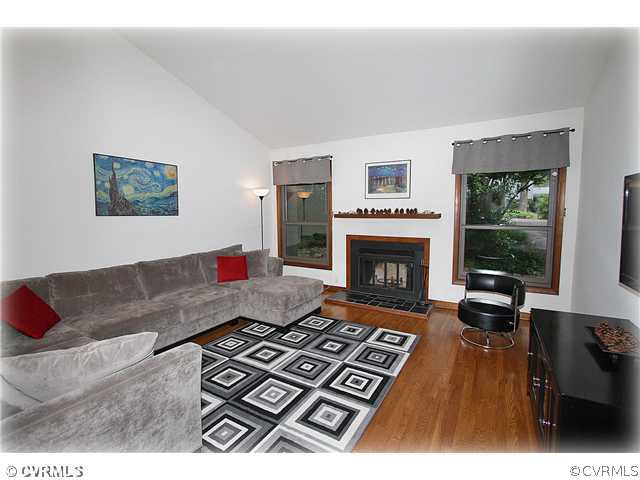 3016 Williamswood Road North Chesterfield, VA 23235 - Photo 3 of 15 a living room with furniture and a fireplace