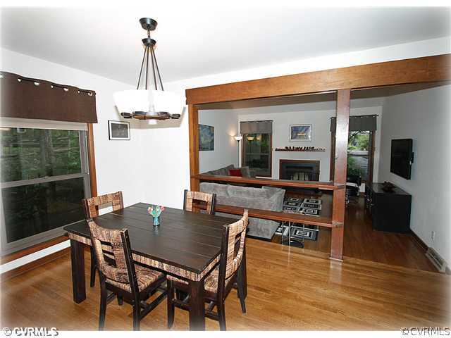 3016 Williamswood Road North Chesterfield, VA 23235 - Photo 4 of 15 a dining room with furniture a chandelier and wooden floor