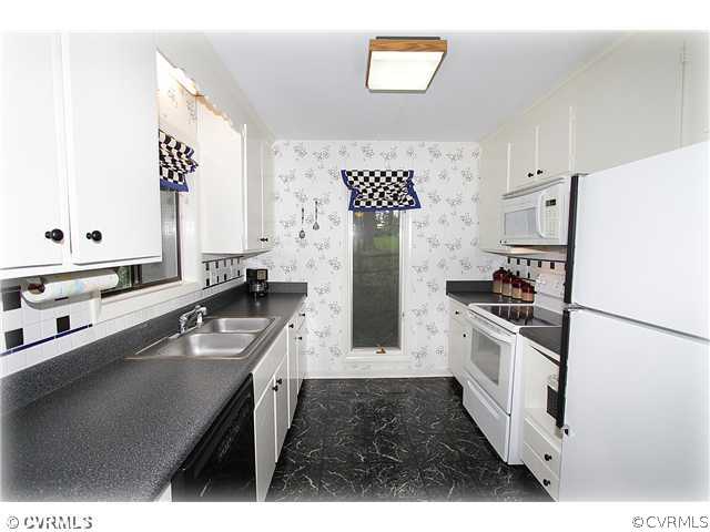 3016 Williamswood Road North Chesterfield, VA 23235 - Photo 5 of 15 a kitchen with granite countertop a sink stove and refrigerator