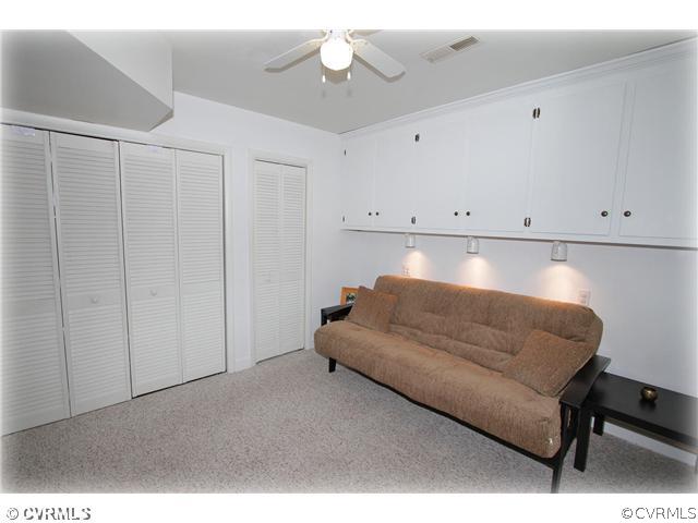 3016 Williamswood Road North Chesterfield, VA 23235 - Photo 7 of 15 a living room with furniture and cabinets