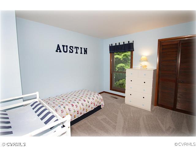 3016 Williamswood Road North Chesterfield, VA 23235 - Photo 9 of 15 a bedroom with a bed and window