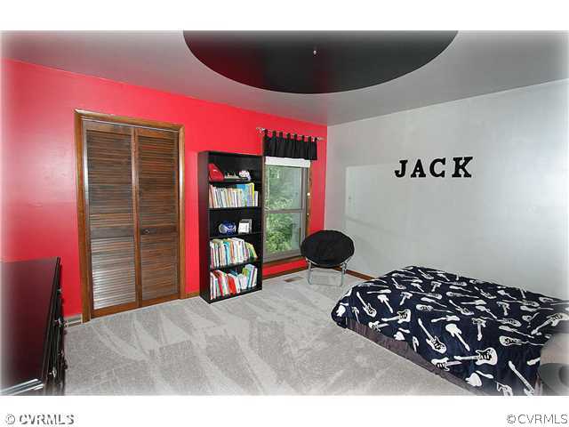 3016 Williamswood Road North Chesterfield, VA 23235 - Photo 10 of 15 a bed room with a bed and a chair