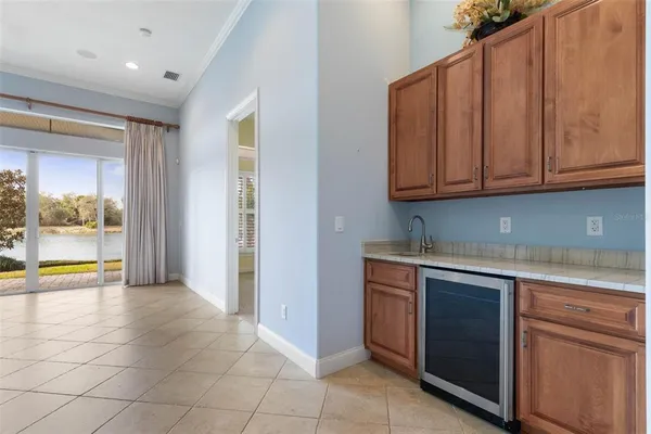 a view of a house with backyard and porch