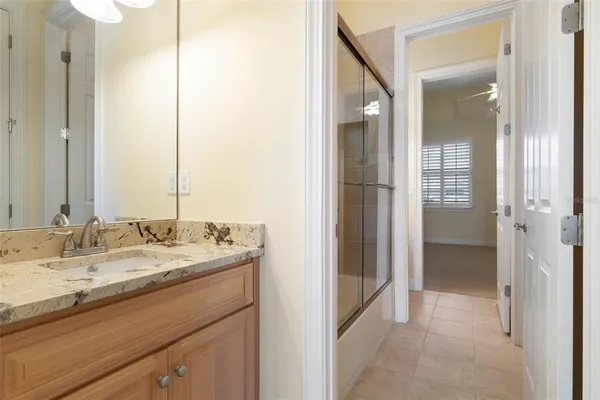 a living room with furniture tv and a fireplace