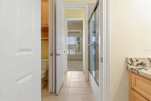 a kitchen with granite countertop cabinets and steel stainless steel appliances
