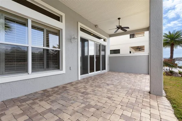 a bathroom with a toilet a sink and a mirror