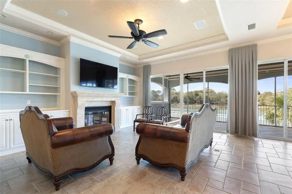 a bathroom with a tub a shower and view