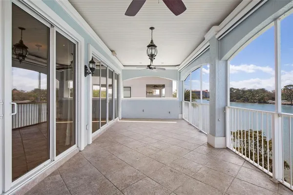 an aerial view of a house with a lake view