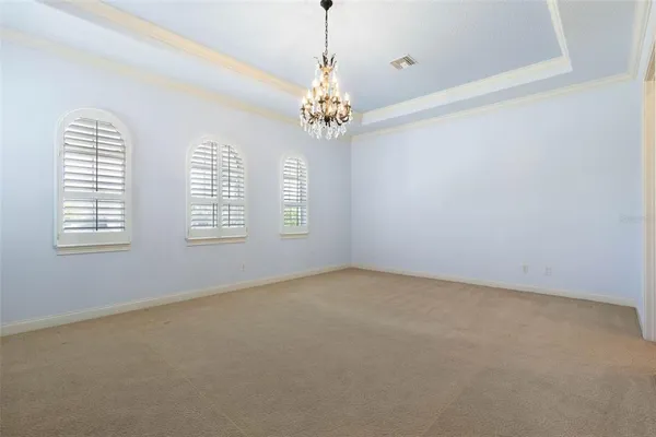 an aerial view of a city and lake view