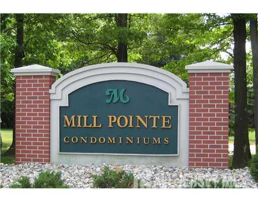 413 College Drive Edison, NJ 08817 - Photo 19 of 20 a sign that is sitting on a brick wall