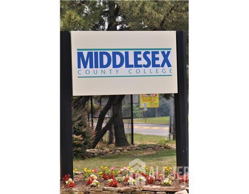 413 College Drive Edison, NJ 08817 - Photo 20 of 20 a sign that is on the side of a building