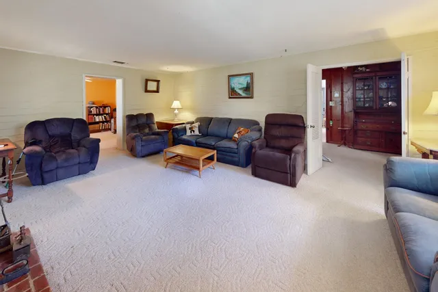 a living room with furniture and a couch