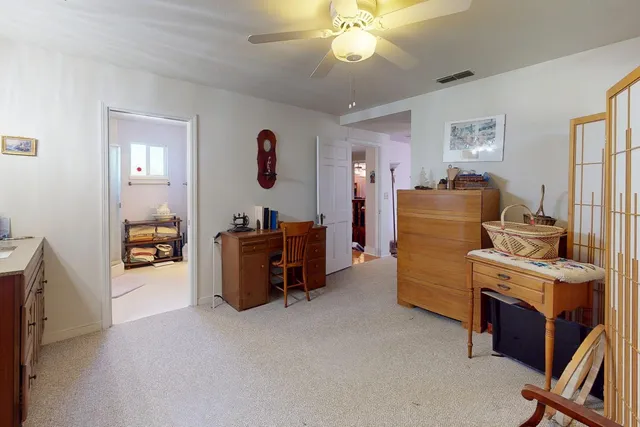 a room with furniture and a flat screen tv