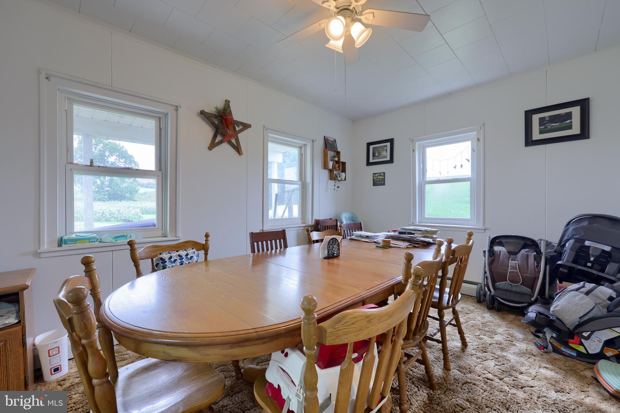 15 Snyder Road Pitman, PA 17964 - Photo 107 of 120 a view of a dining room with furniture and a chandelier