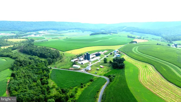 an aerial view of a house having patio