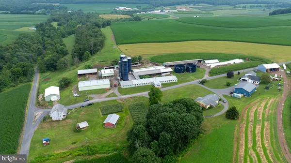 a front view of a house with garden and porch