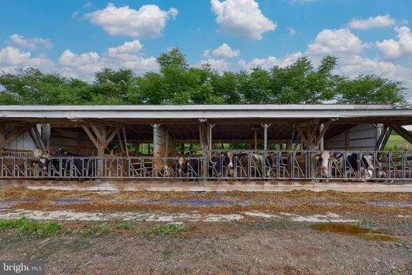 a view of a livingroom with furniture and a flat screen tv