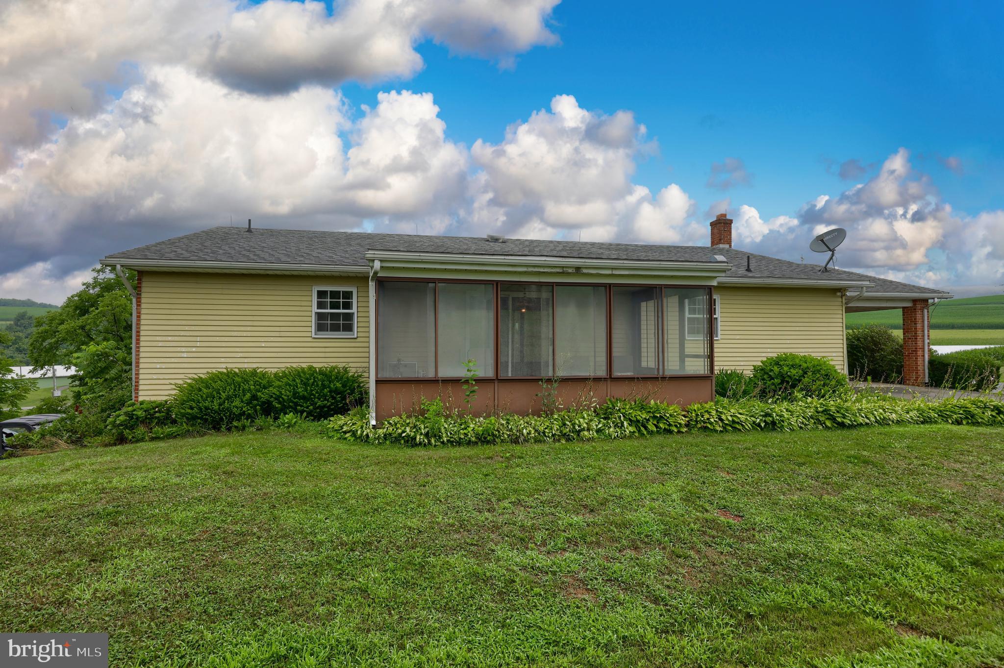 15 Snyder Road Pitman, PA 17964 - Photo 66 of 120 a view of a house with a yard and plants