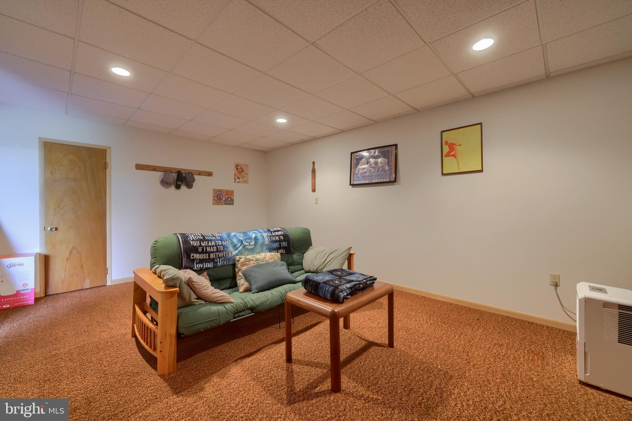 15 Snyder Road Pitman, PA 17964 - Photo 71 of 120 a living room with furniture and a window