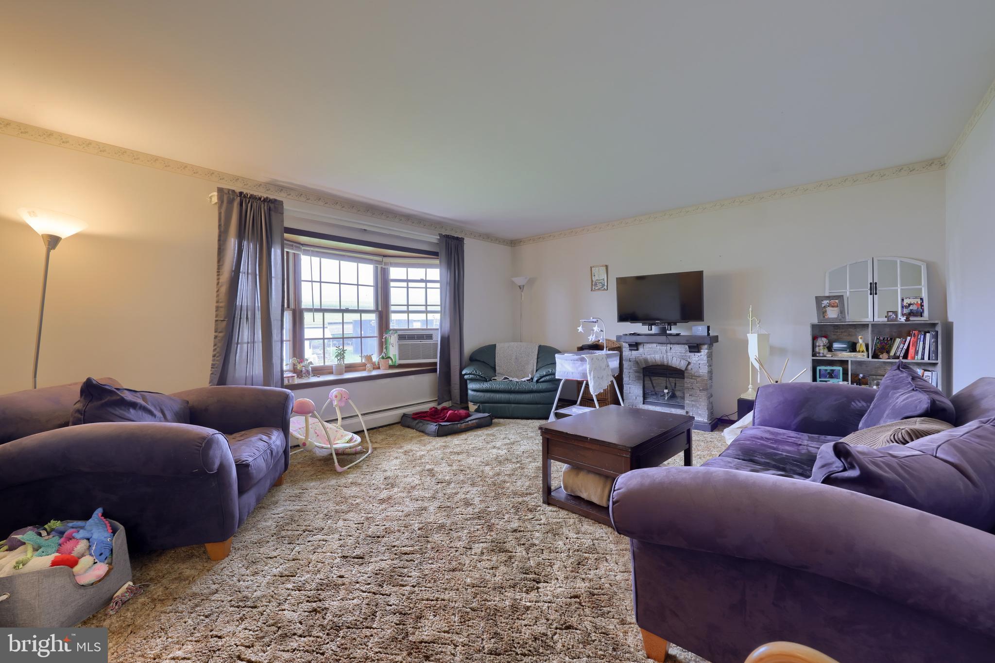 15 Snyder Road Pitman, PA 17964 - Photo 74 of 120 a living room with furniture and a flat screen tv