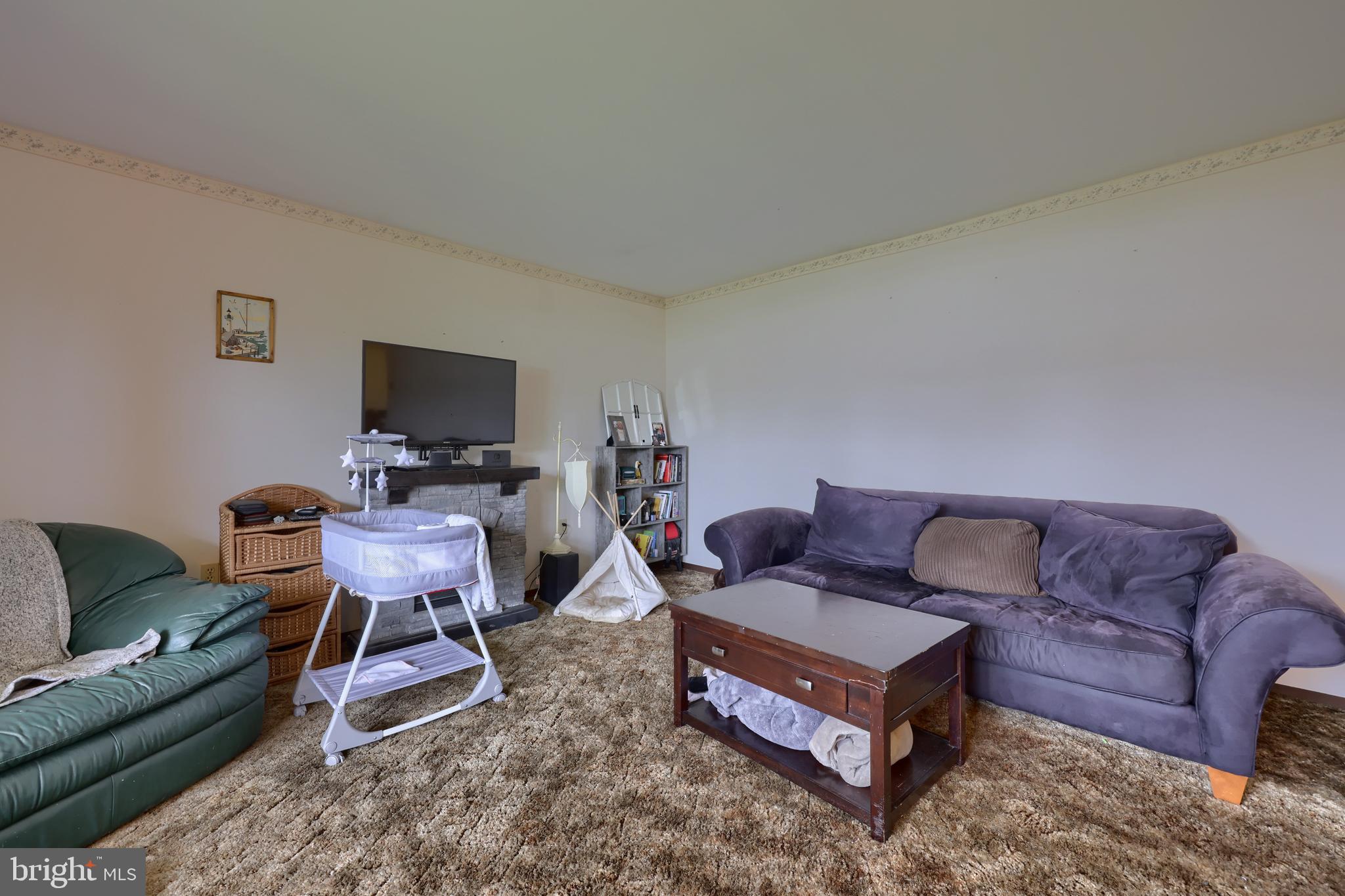 15 Snyder Road Pitman, PA 17964 - Photo 75 of 120 a living room with furniture and a flat screen tv