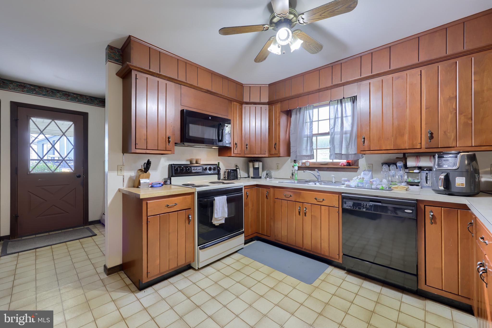 15 Snyder Road Pitman, PA 17964 - Photo 83 of 120 a kitchen with stainless steel appliances granite countertop a stove sink and cabinets