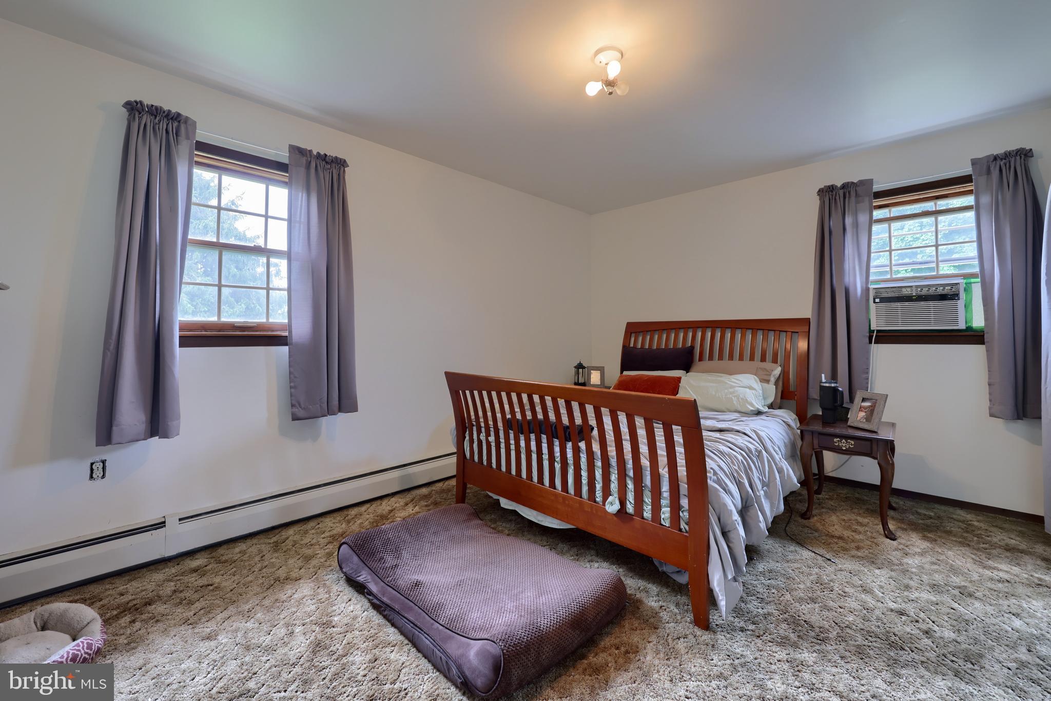 15 Snyder Road Pitman, PA 17964 - Photo 87 of 120 a bedroom with a bed and wooden floor