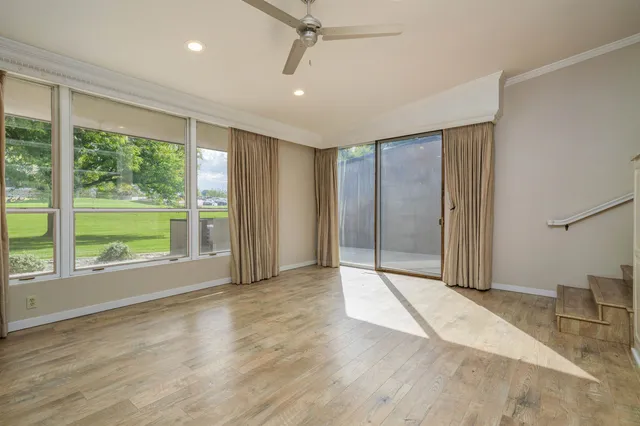 a view of a livingroom with a staircase