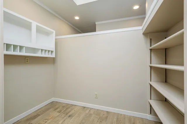 a view of an empty walk in closet