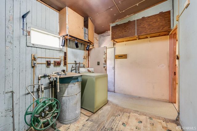 a view of a yard & tree s