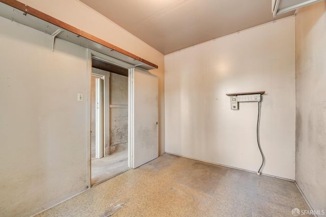 a view of a room with rack on the wall