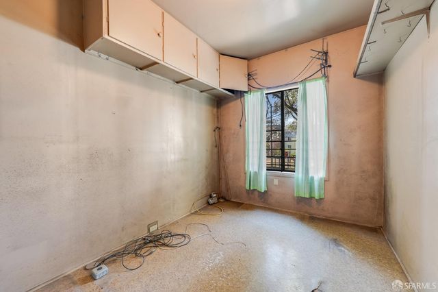 a view of a room with rack on the wall