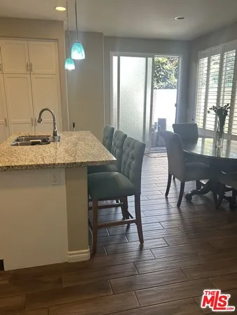 a bathroom with a sink toilet and vanity
