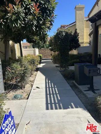 a view of outdoor space and front view of a house