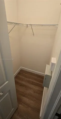 a view of small space with racks on the wall