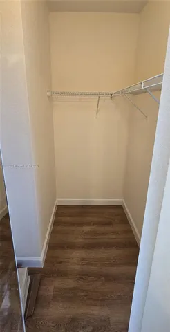 a view of small space with racks on the wall