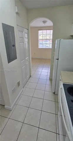 a bathroom with a vanity and a shower
