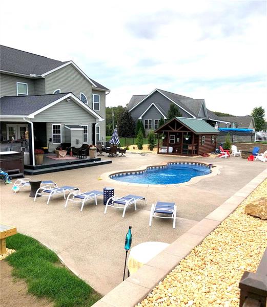 66 Pigeon Creek Road Eighty Four, PA 15330 - Photo 19 of 25 Enjoy Your Stay Vacation this year!! Why go anywhere else! The pool has built-in seating and a tanning ledge.