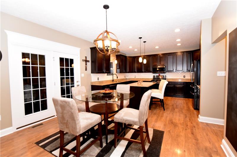 66 Pigeon Creek Road Eighty Four, PA 15330 - Photo 5 of 25 Looking for an Updated kitchen! 23x12 Center Island Double french door leads to the backyard Paradise. Everyday is like a vacation!