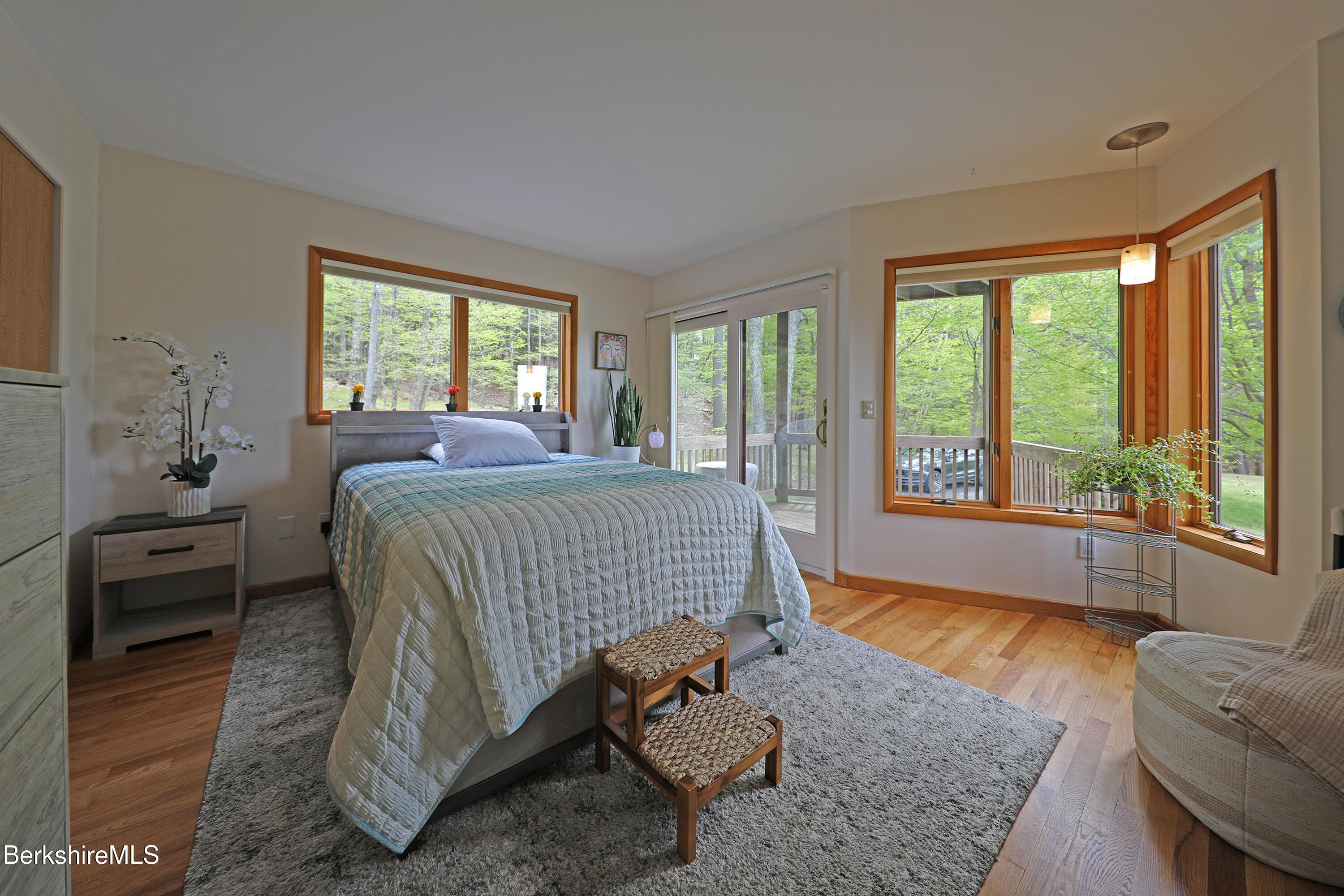 126 Temple Road New Lebanon, NY 12125 - Photo 9 of 37 a bed sitting in a bedroom next to a window