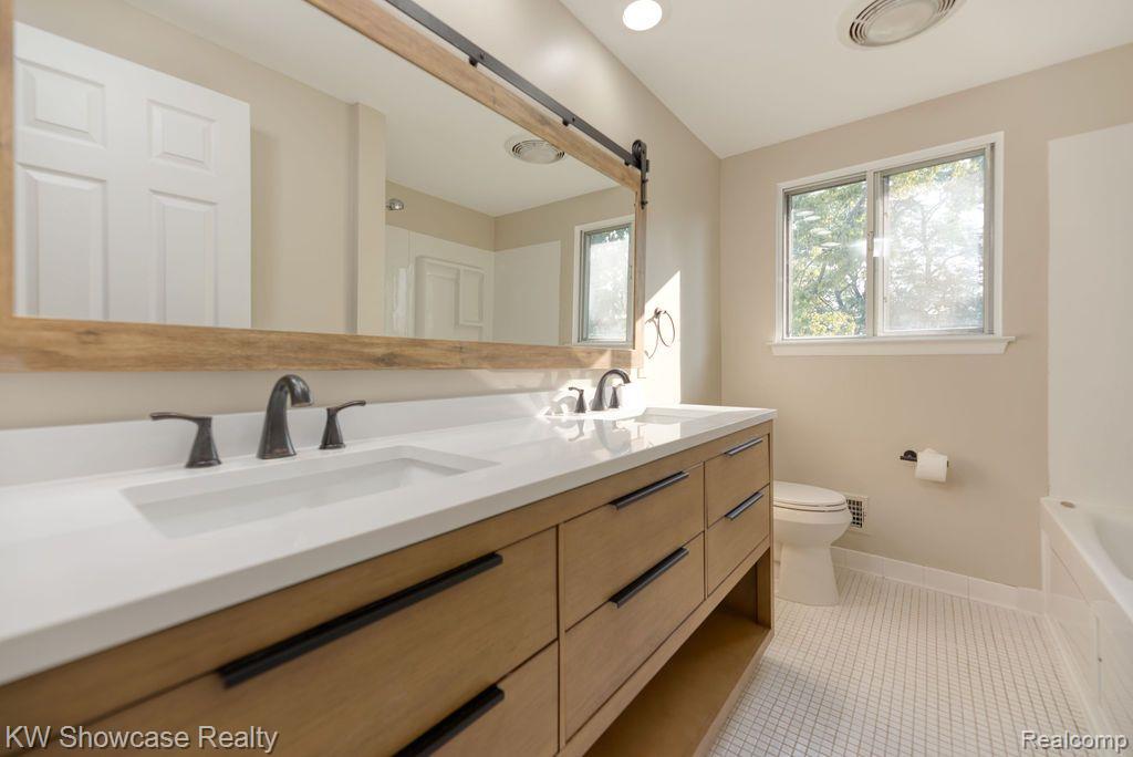 16008 Newburgh Road Livonia, MI 48154 - Photo 22 of 29 New vanity and mirror in secnd floor primary bath