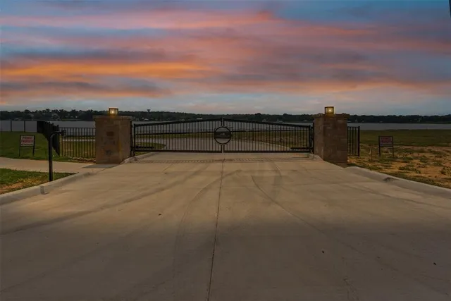 a view of a park with large trees