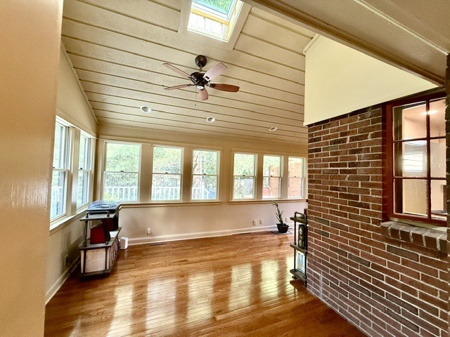 720 South New Street Champaign, IL 61820 - Photo 14 of 73 a view of a room with wooden floor and furniture