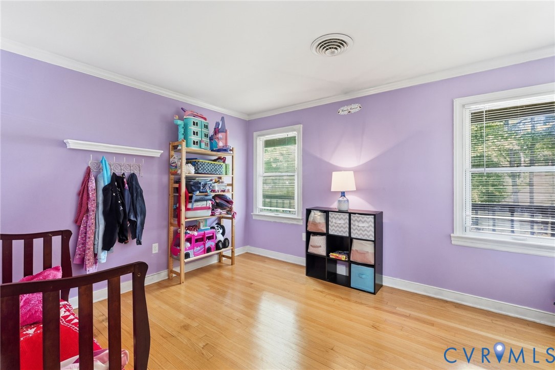 13611 Winterberry Ridge Midlothian, VA 23112 - Photo 20 of 30 Hardwood flooring, crown molding, two windows with