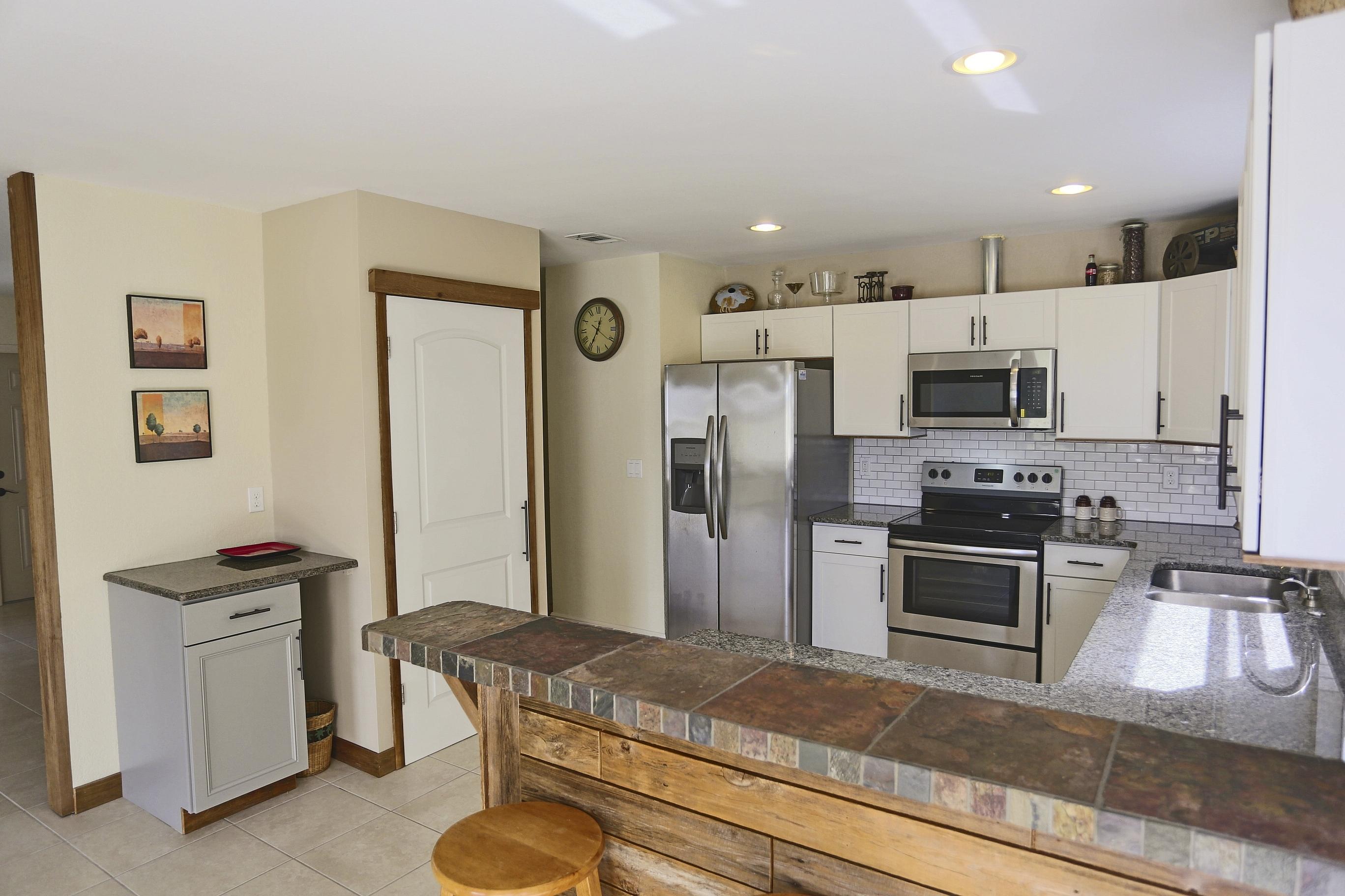 2492 Southeast Wishbone Road Port St. Lucie, FL 34952 - Photo 13 of 27 IMG_0517 Kitchen over Bar