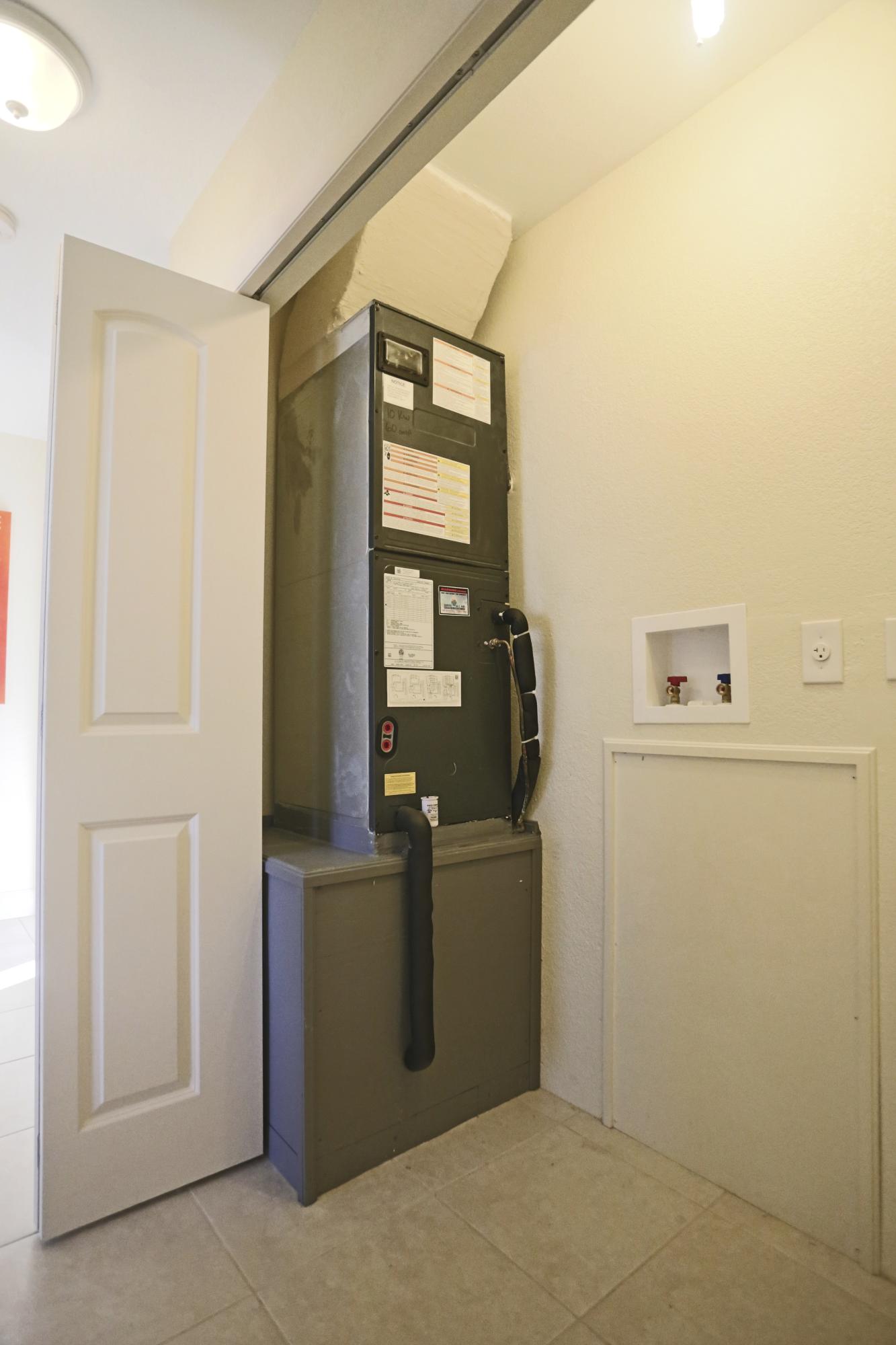 2492 Southeast Wishbone Road Port St. Lucie, FL 34952 - Photo 17 of 27 IMG_0655 AC Air Handler