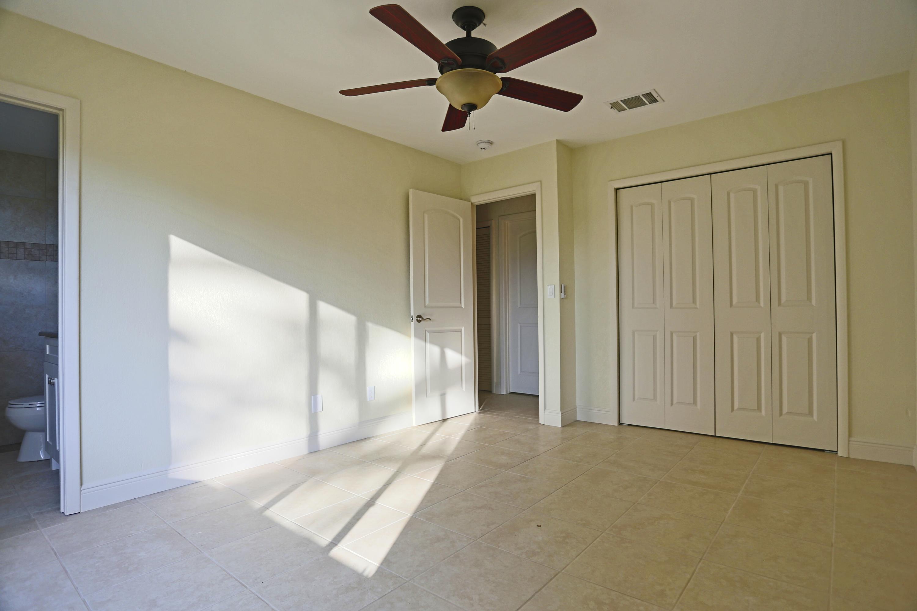 2492 Southeast Wishbone Road Port St. Lucie, FL 34952 - Photo 21 of 27 IMG_0652 Master Bedroom 1